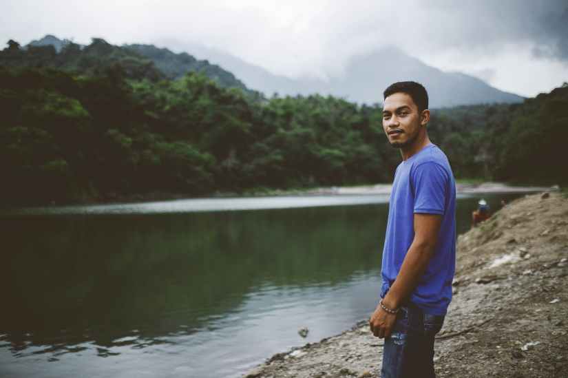 Man standing near body of water